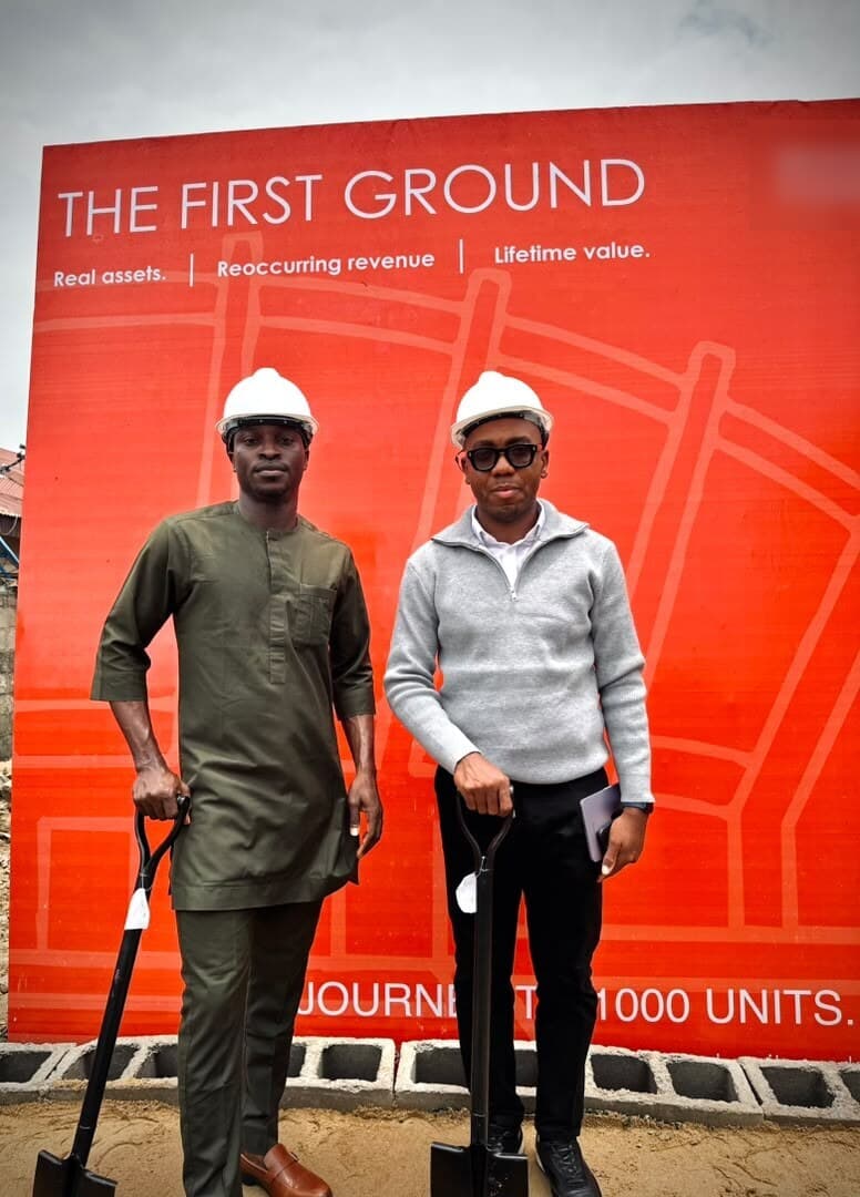 Two members of the project team with shovels at the groundbreaking